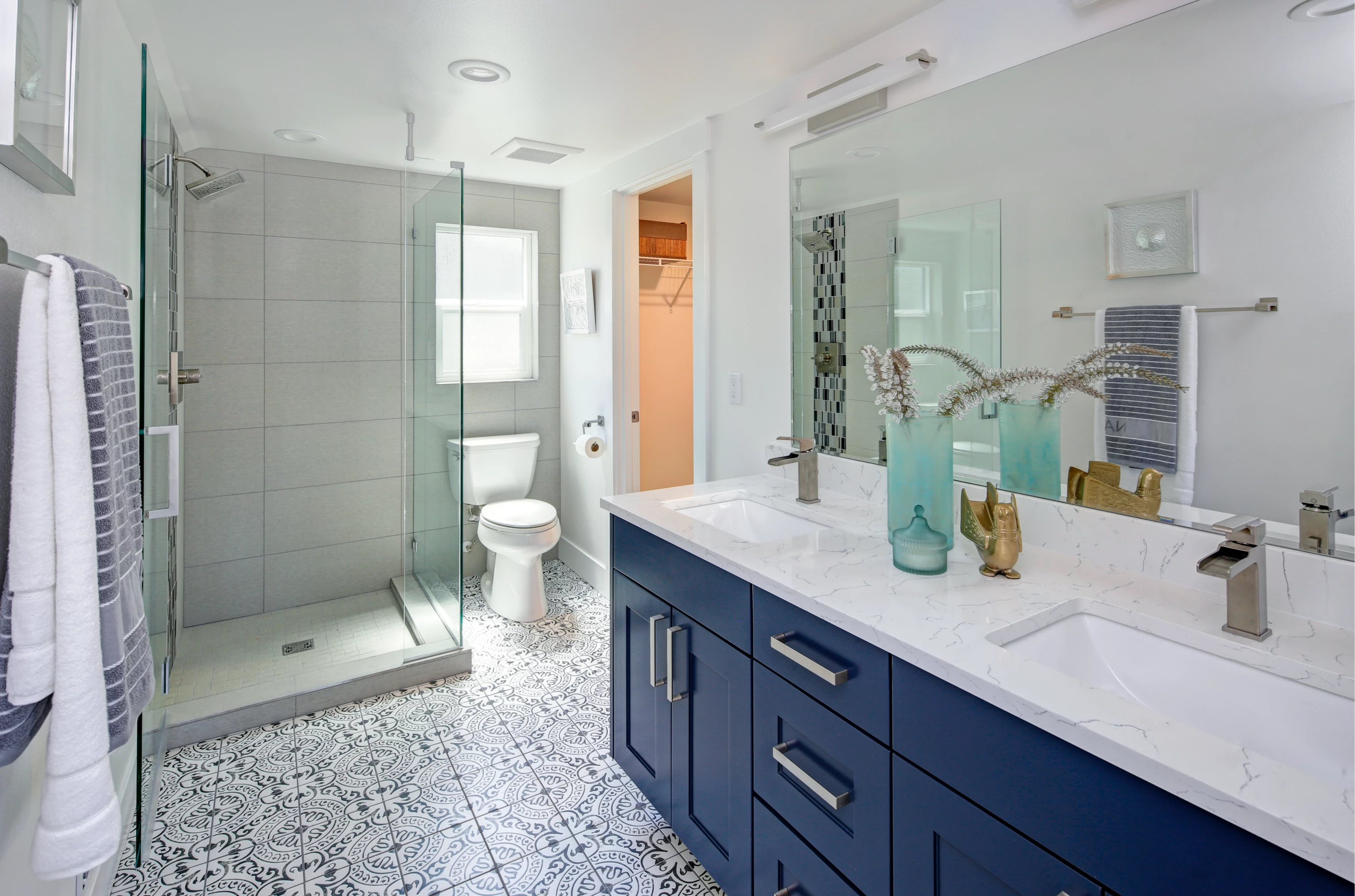 custom bathroom with shower and vanity