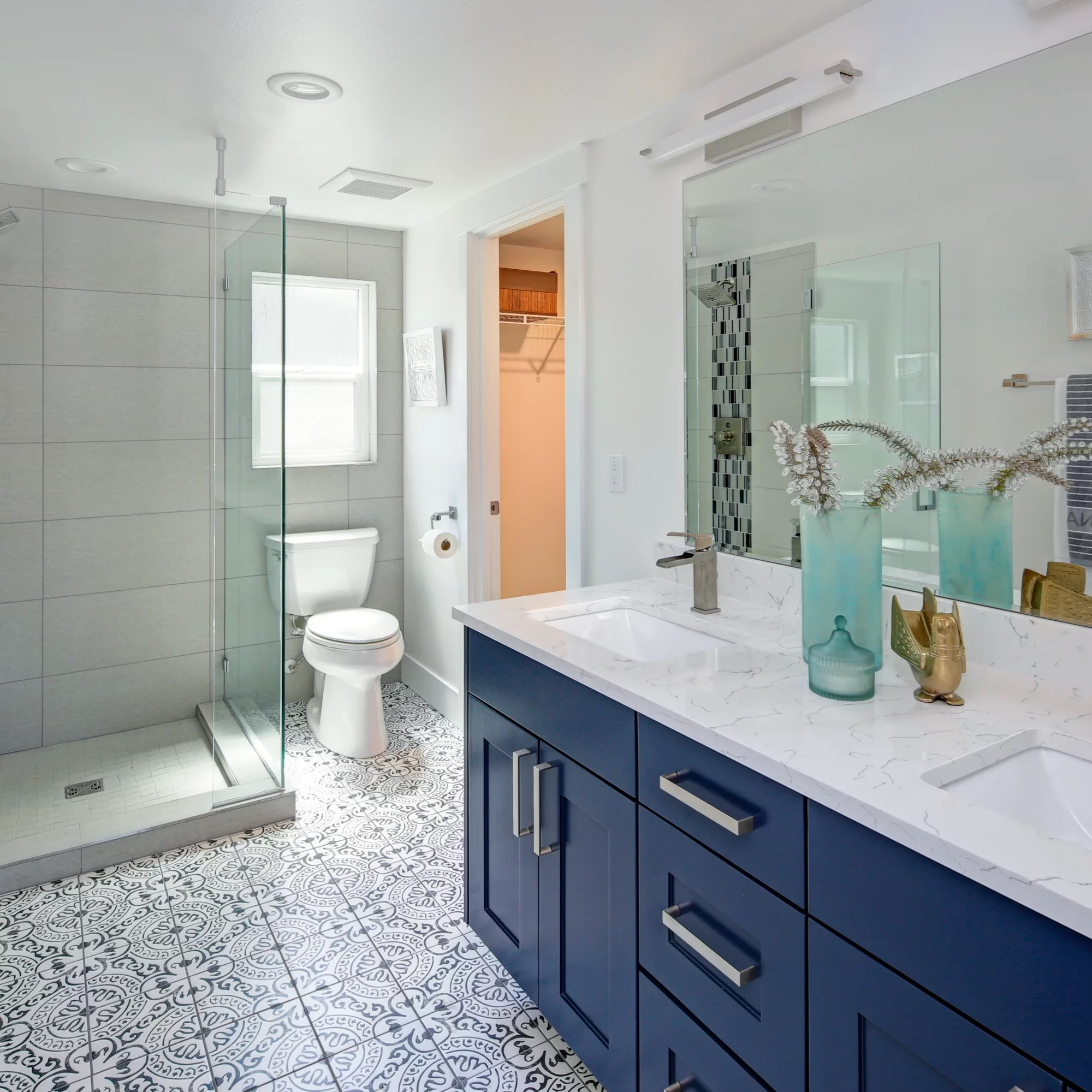 custom bathroom with shower and vanity